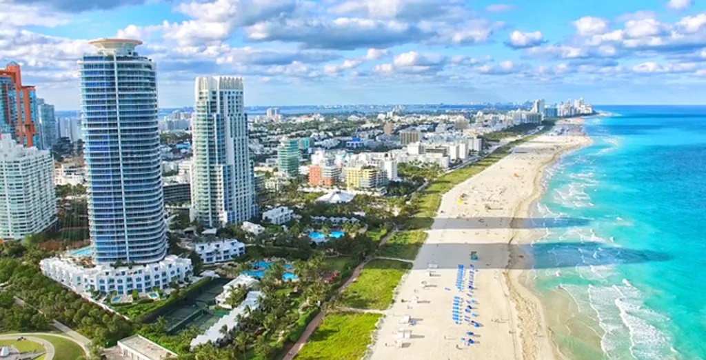 Miami: aerial view of South Beach, its waterfront towers and its beach